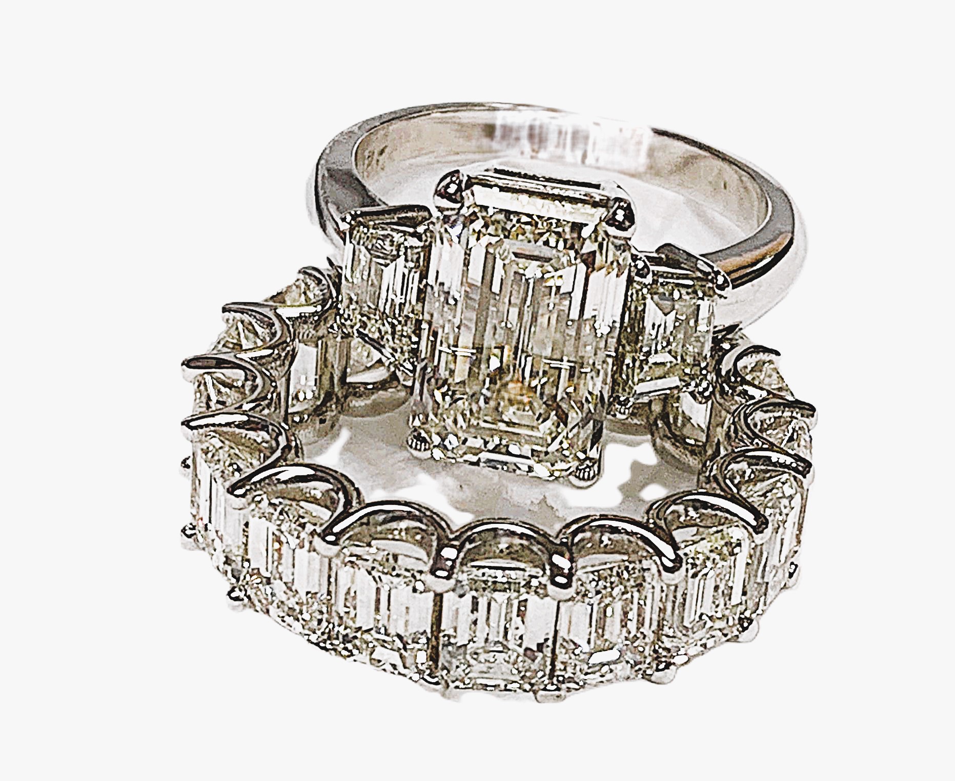 Emerald & Trapezoid Three Stone Ring with Huge Eternity Band